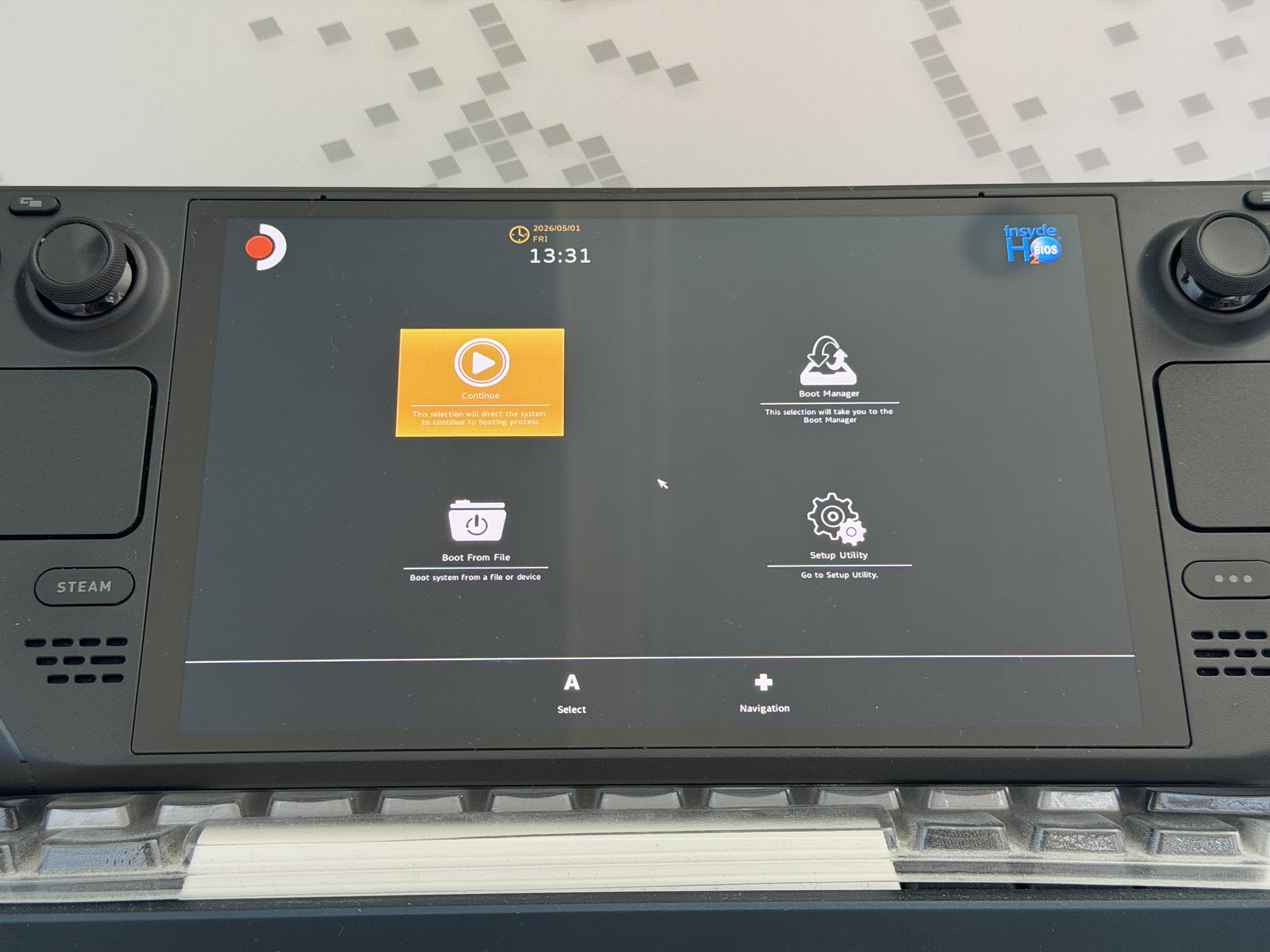 Steam Deck showing the InsydeH2O BIOS main menu with options for Continue, Boot Manager, Boot From File, and Setup Utility